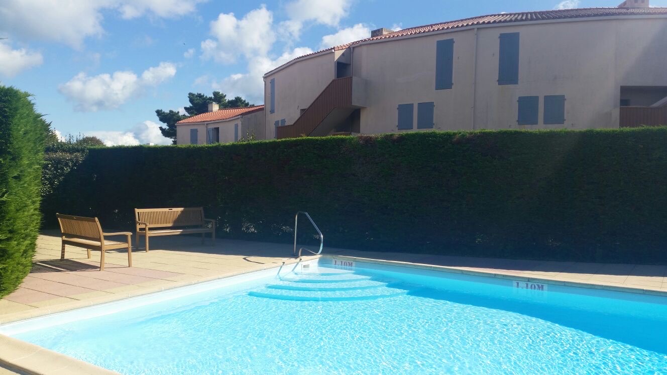 The shared gated swimming pool in the residence
