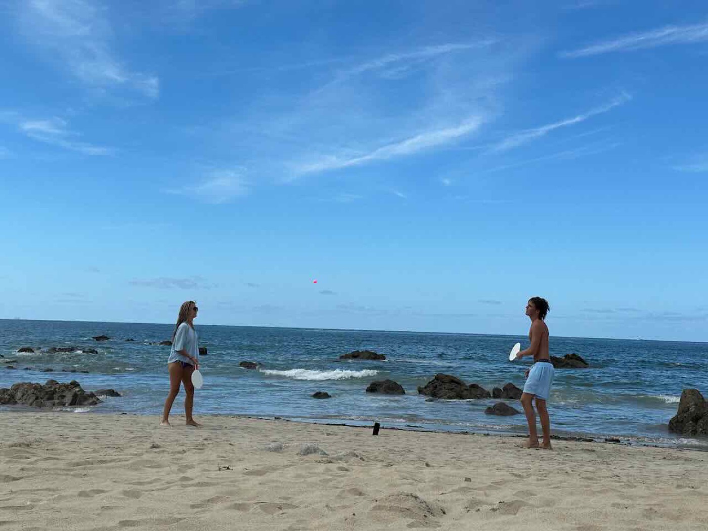 A game of beach bats on the sand