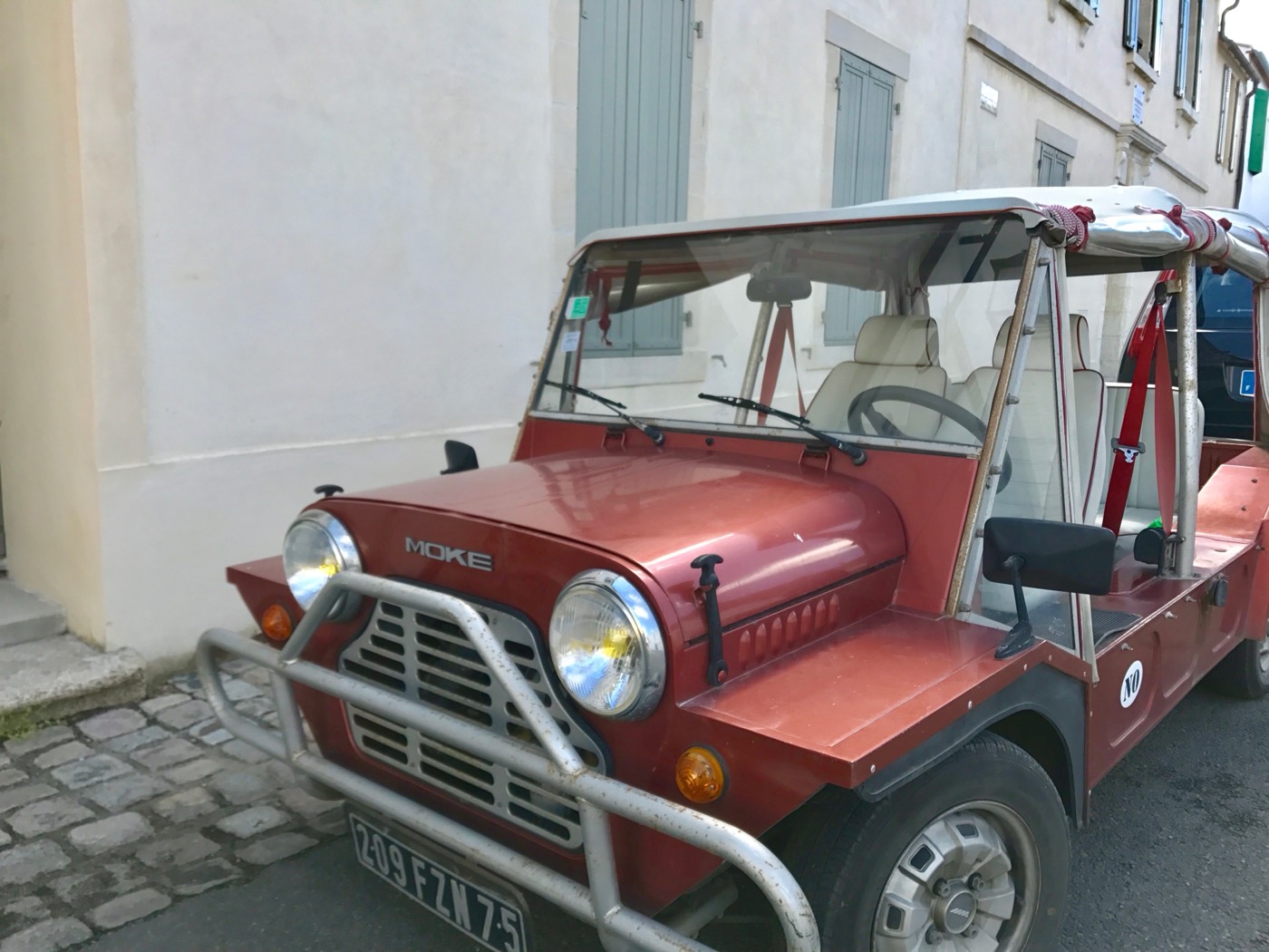 A Mini Moke parked on the island